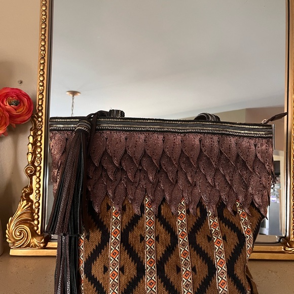 Sharif Couture
Beaded Tapestry
Tote with Leather Trim - Picture 4 of 16